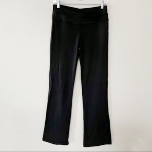Lululemon black flared leggings with origami pleat front size 8